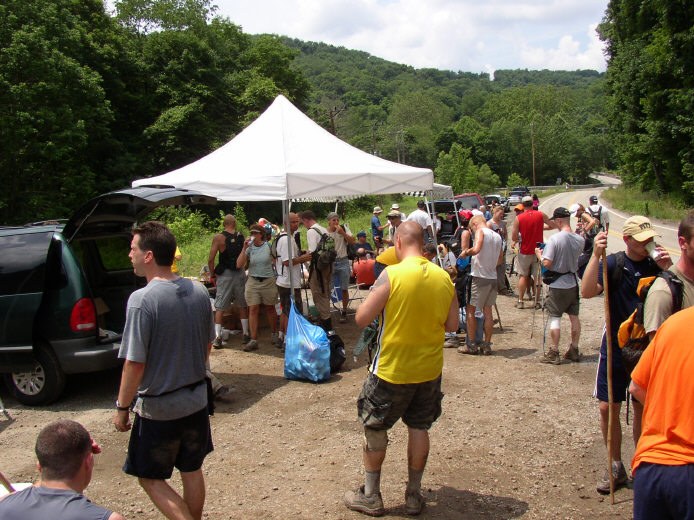 A crowd gathers at Checkpoint 3, mile 20.1