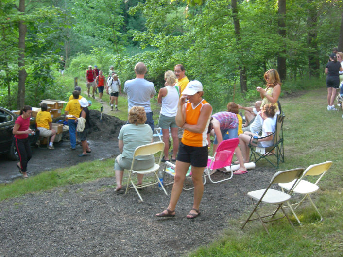 Folks cheer on more finishers