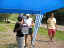 Volunteer refills water at AS7